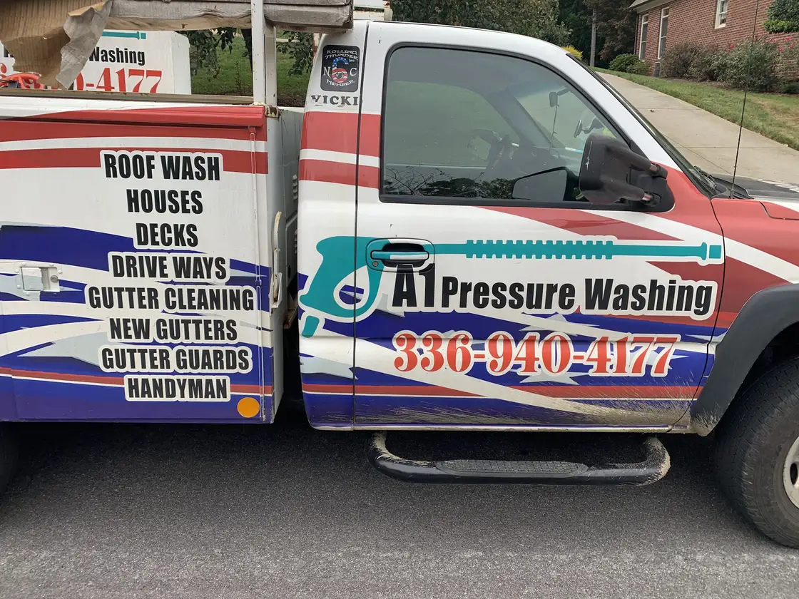 The side of the A1 truck listing roof wash, houses, decks, driveways, gutter cleaning, new gutters, gutter guards and handyman